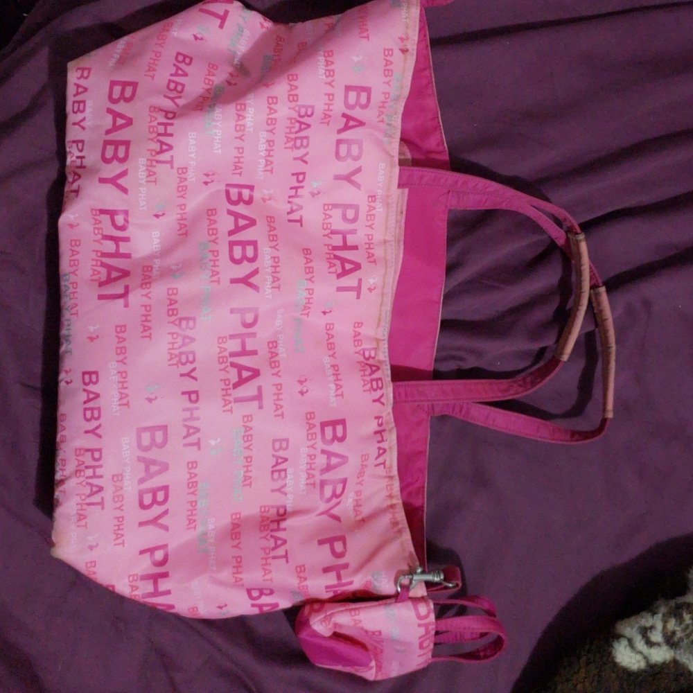 A pink baby phat bag